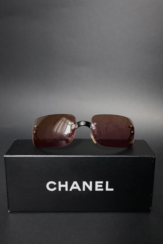 Chanel rimless sunglasses with logo in the middle