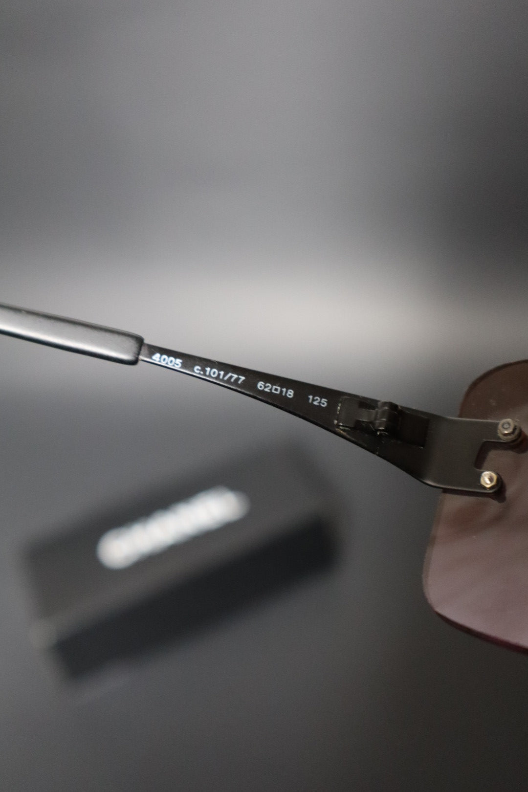 Chanel rimless sunglasses with logo in the middle