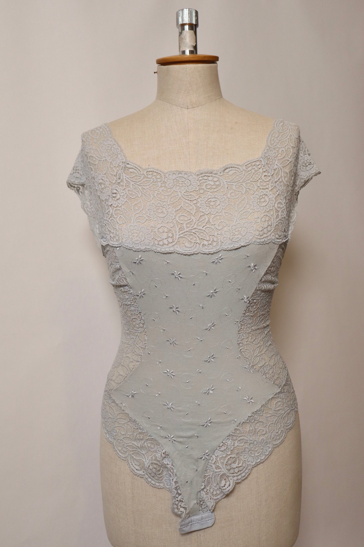 Soft blue / gray lace body with embroidered flowers size M - L