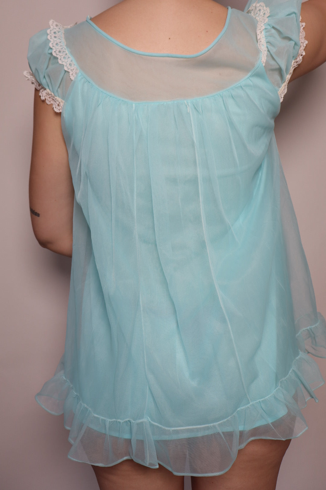 1960’s soft blue babydoll size small with embroidered bow & flower detail