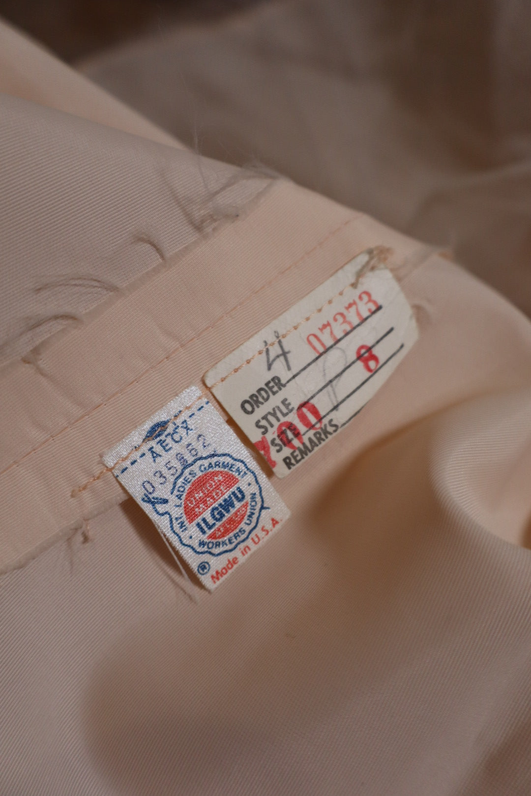 1955’s soft pink prom dress with basque waistline, size M