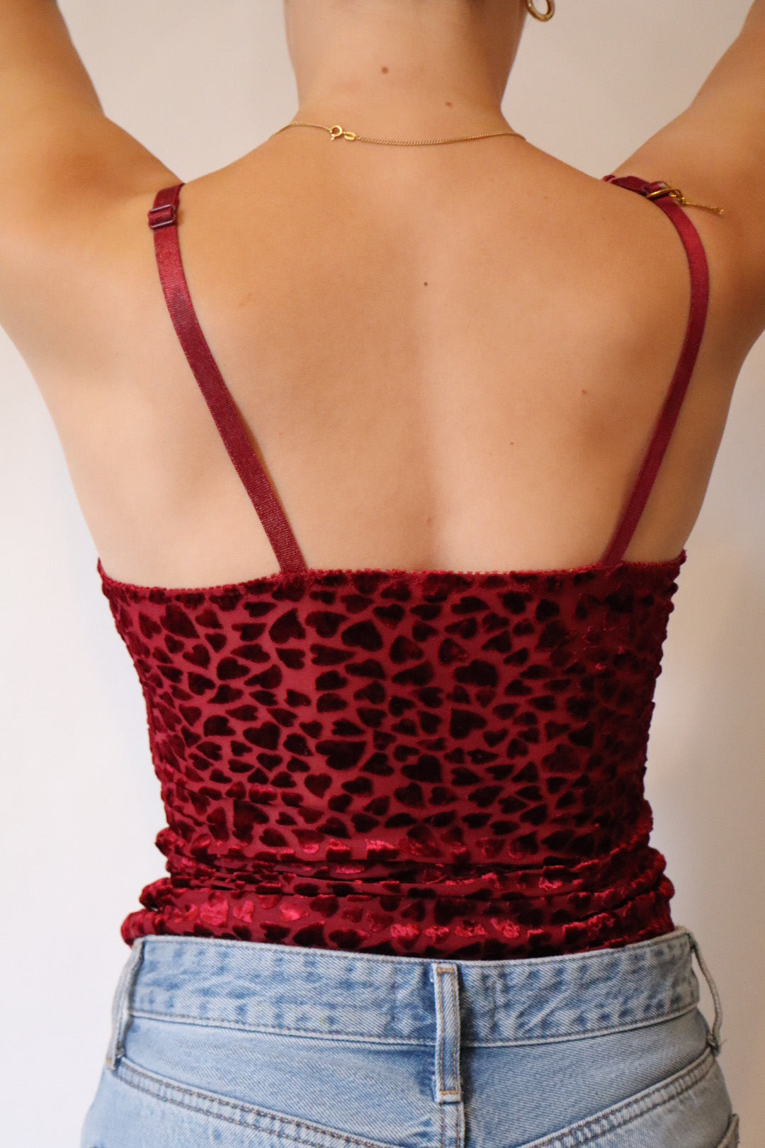 Red camitop with little velvet hearts all over size M / L
