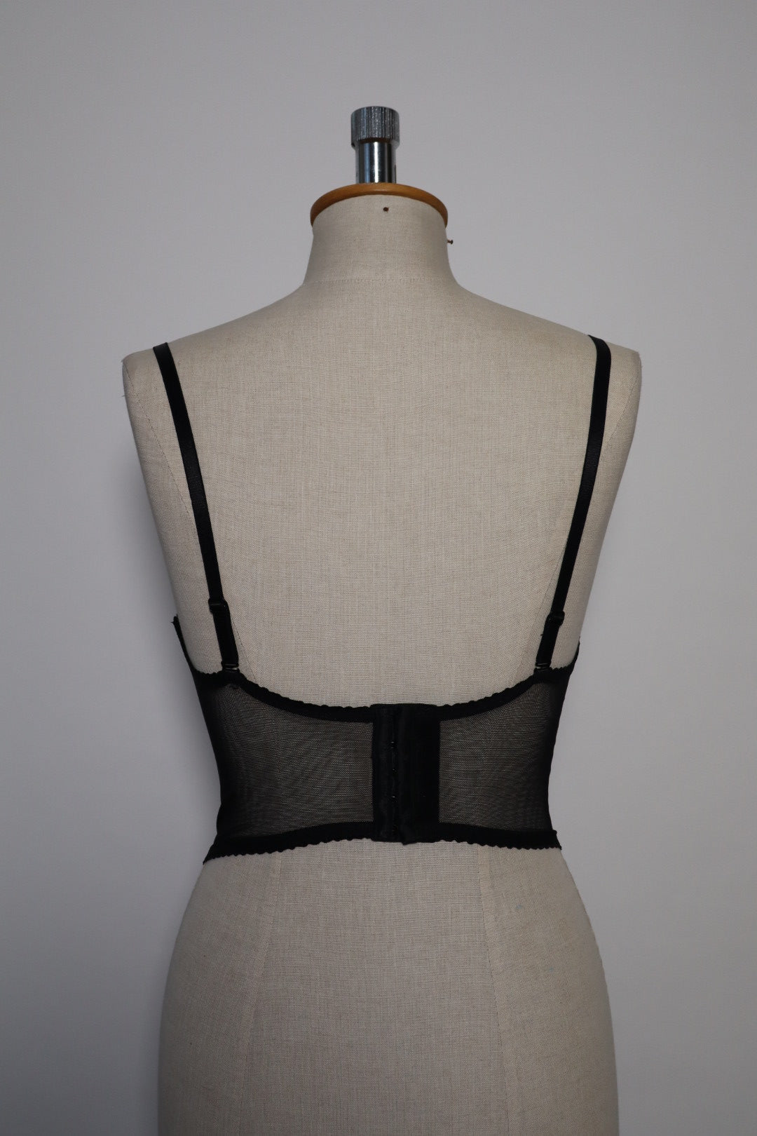 Black bustier with lace details and see trough back and sides