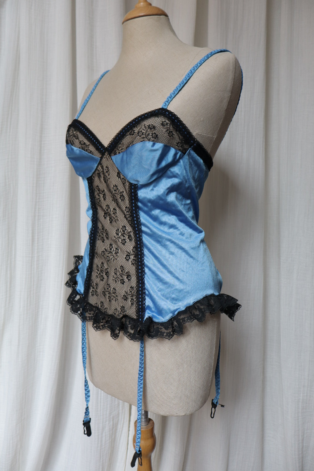 1980’s blue bustier top with black lace, size M (Made in USA)