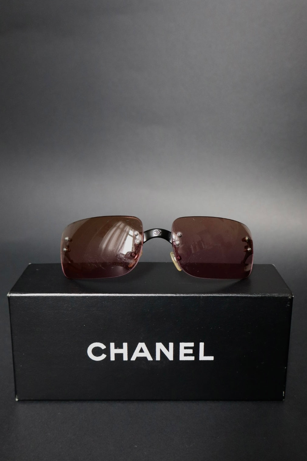 Chanel rimless sunglasses with logo in the middle