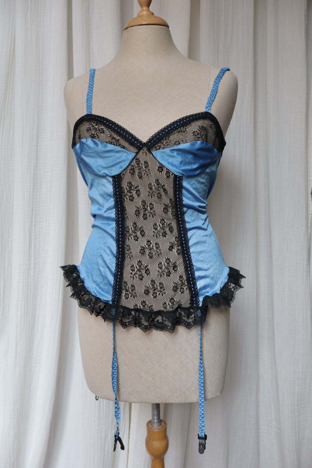 1980’s blue bustier top with black lace, size M (Made in USA)