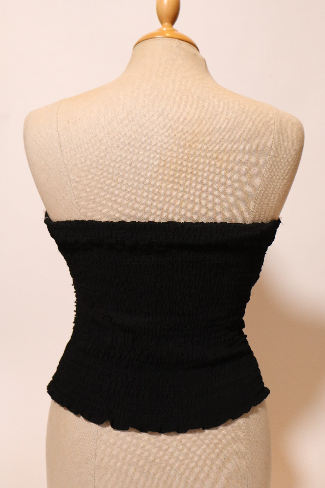 Black bustier top with pleads and beads, size L