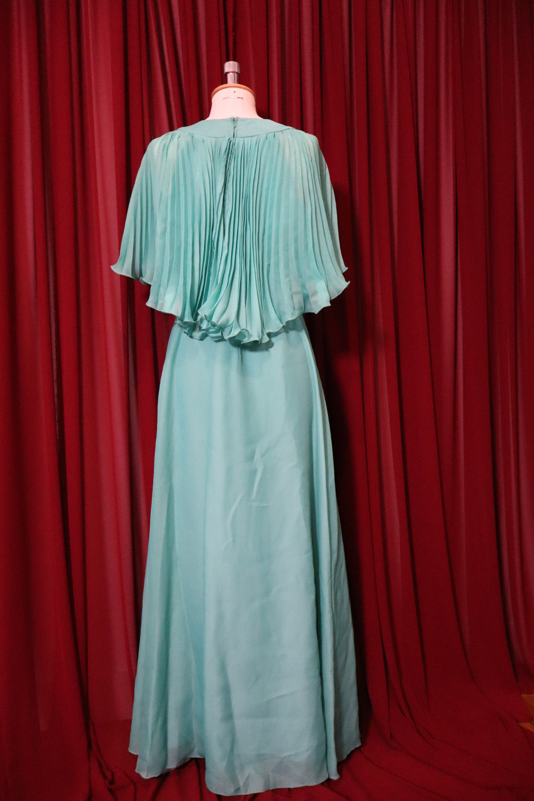 1970’s turquoise long gown with pleaded cape ‘sleeves’ - size L