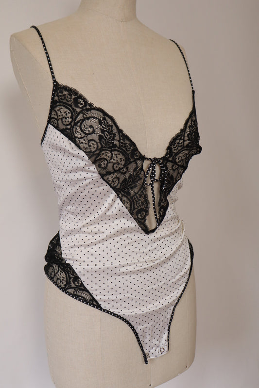 White body with black lace and polka dots size Large