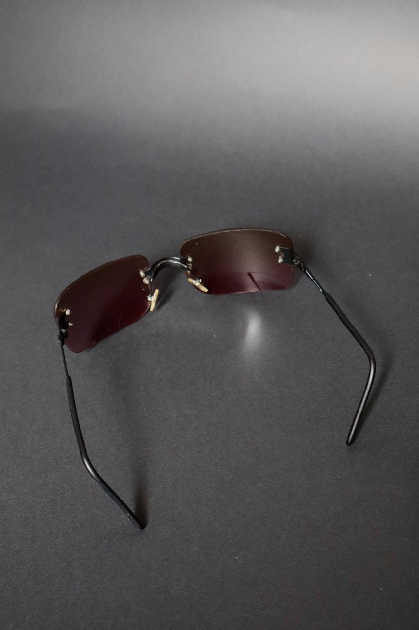 Chanel rimless sunglasses with logo in the middle
