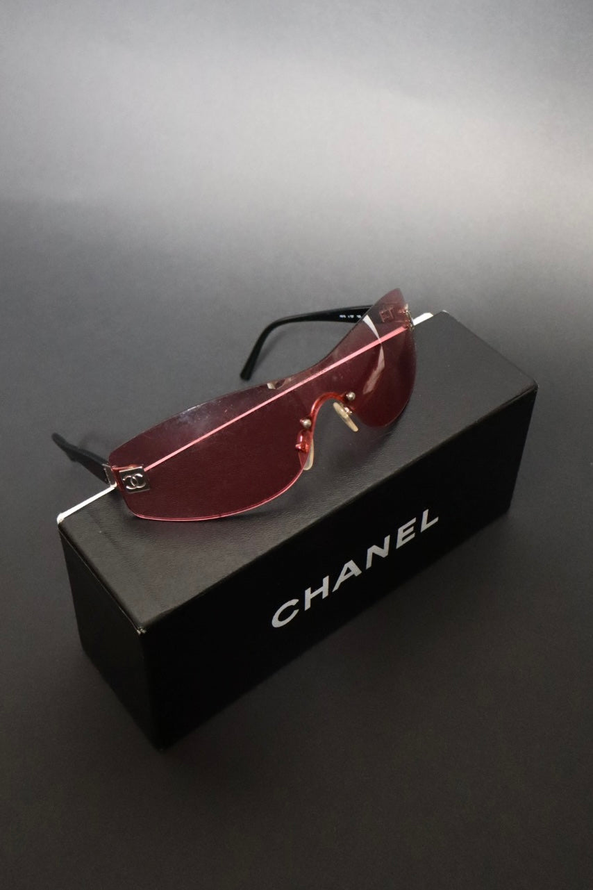 Chanel rimless pink sunglasses with logo on each side