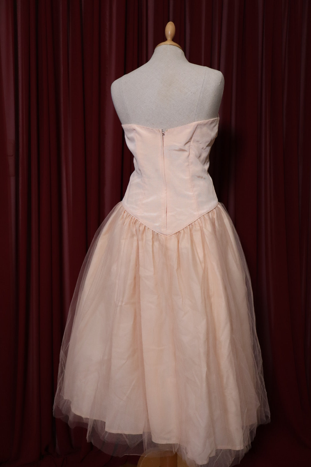 1955’s soft pink prom dress with basque waistline, size M