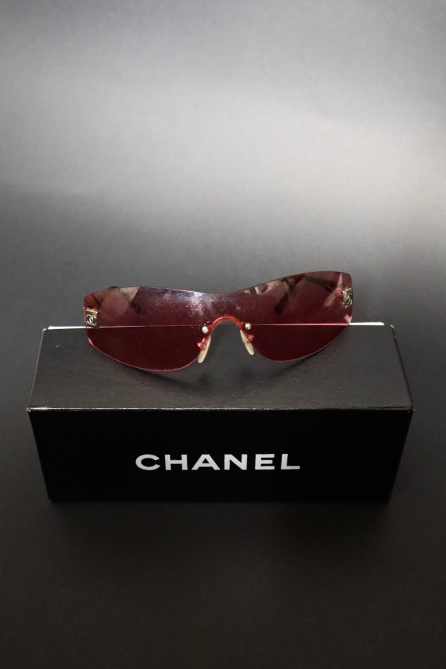 Chanel rimless pink sunglasses with logo on each side