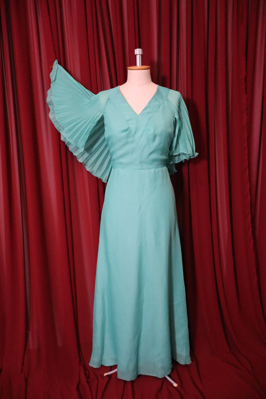 1970’s turquoise long gown with pleaded cape ‘sleeves’ - size L
