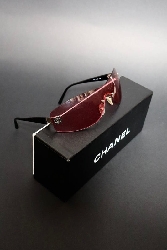 Chanel rimless pink sunglasses with logo on each side