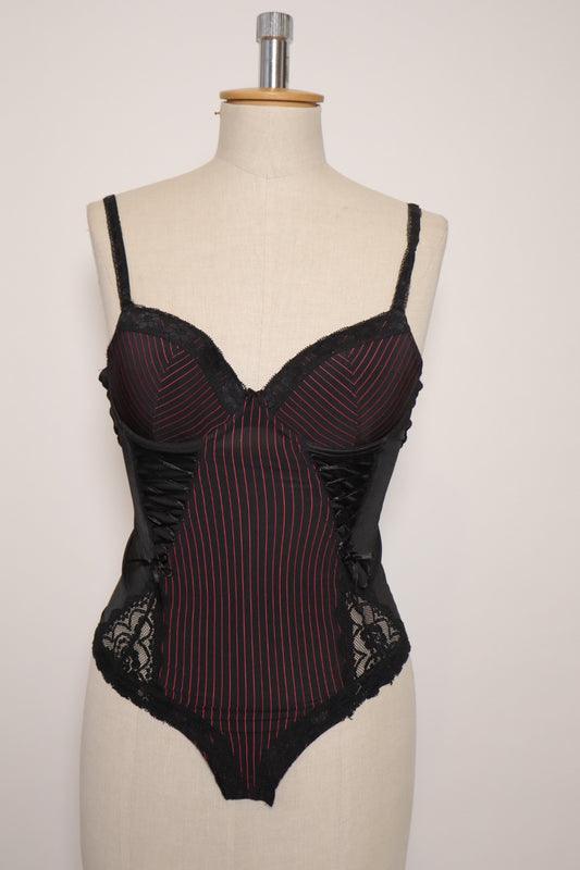Black bustier with red stripes, open back and corset details on the sides