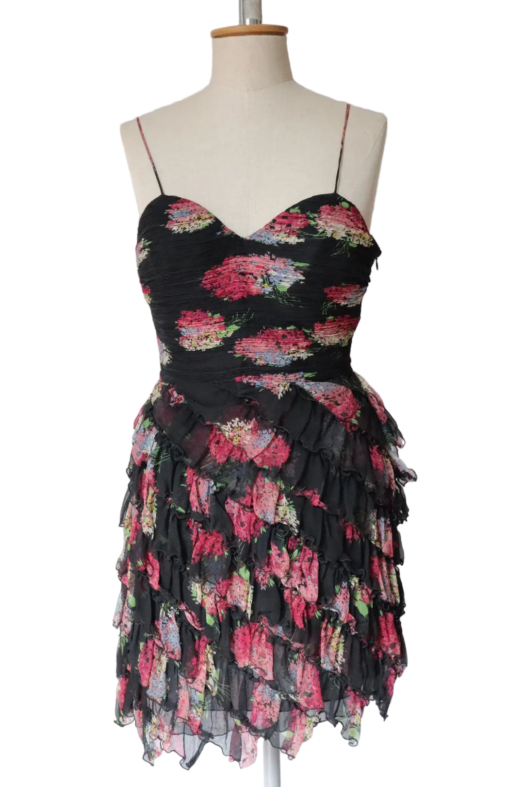 100% silk dress with flower print and ruffles. Size M