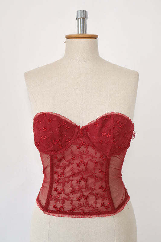 Red Triumph bustier with lace details and see trough back size