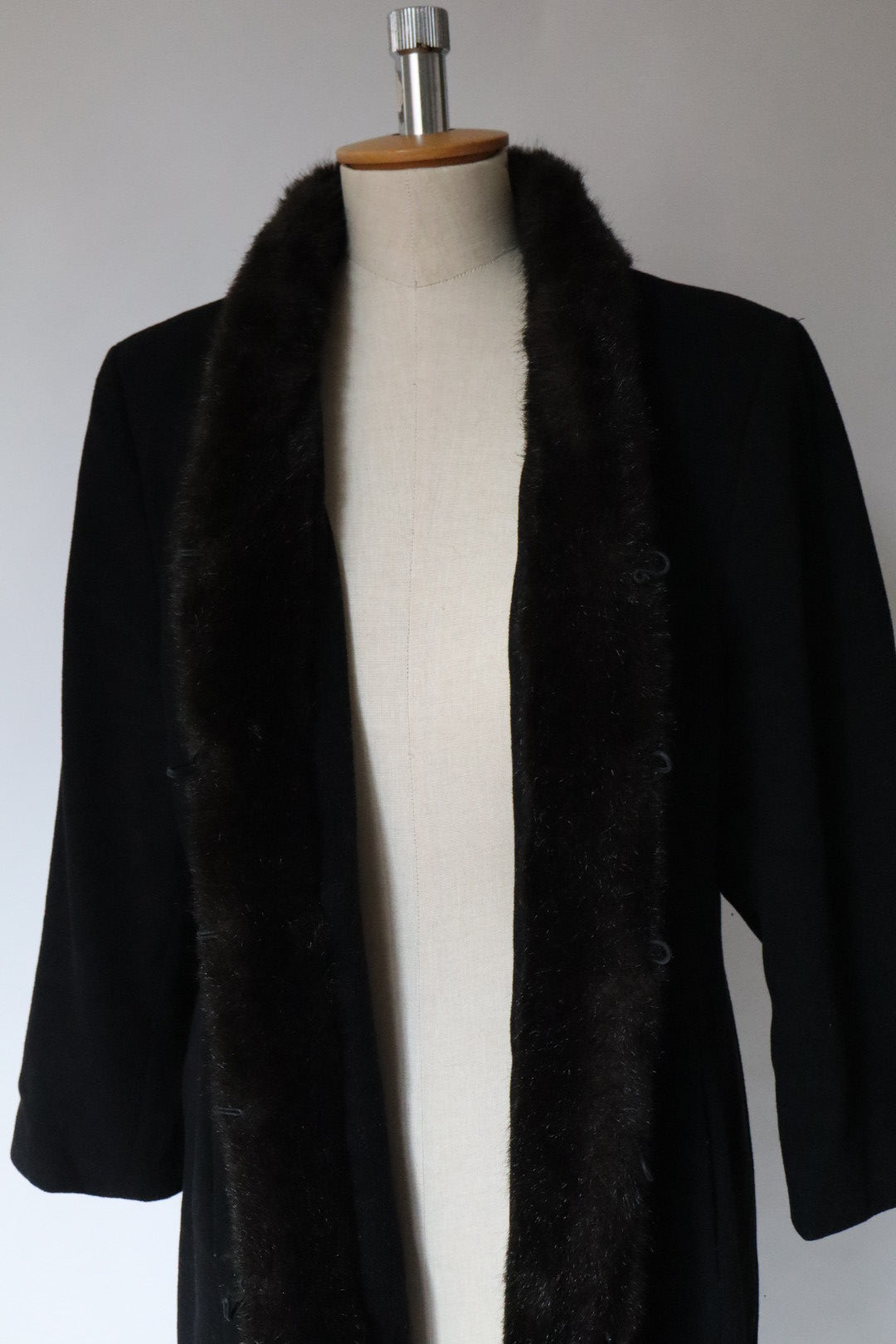 Long black coat with faux fur trim, size XL