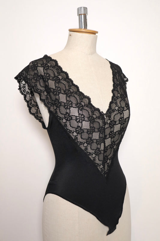 Black body with lace décolletée size medium