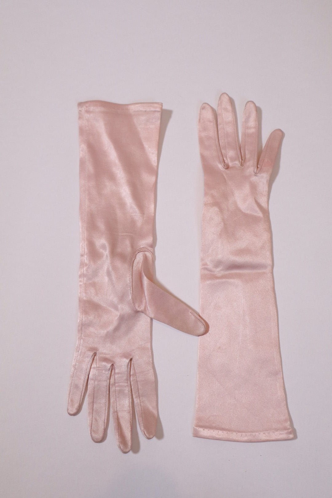 Soft pink satin 1950’s gloves, size 5