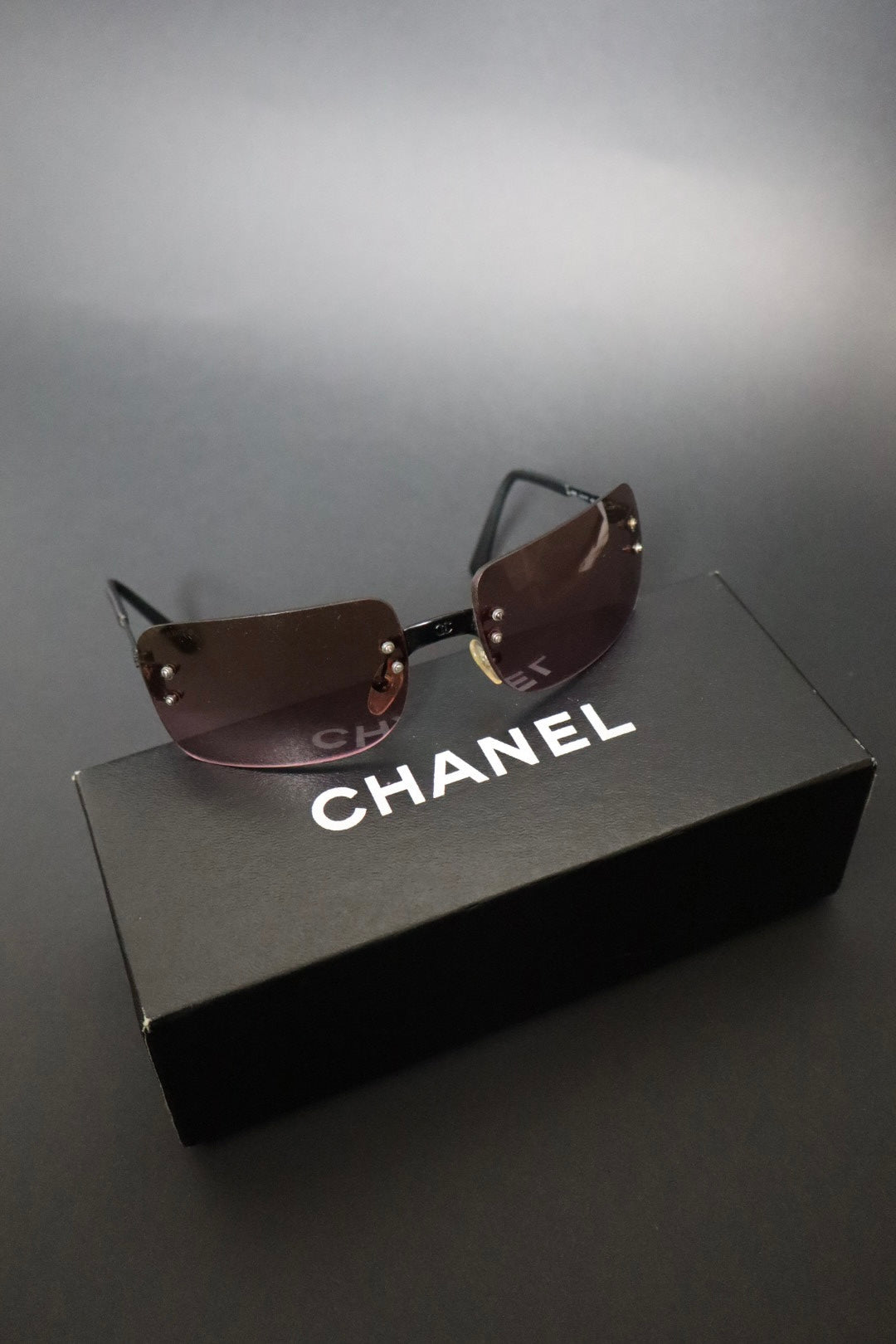 Chanel rimless sunglasses with logo in the middle