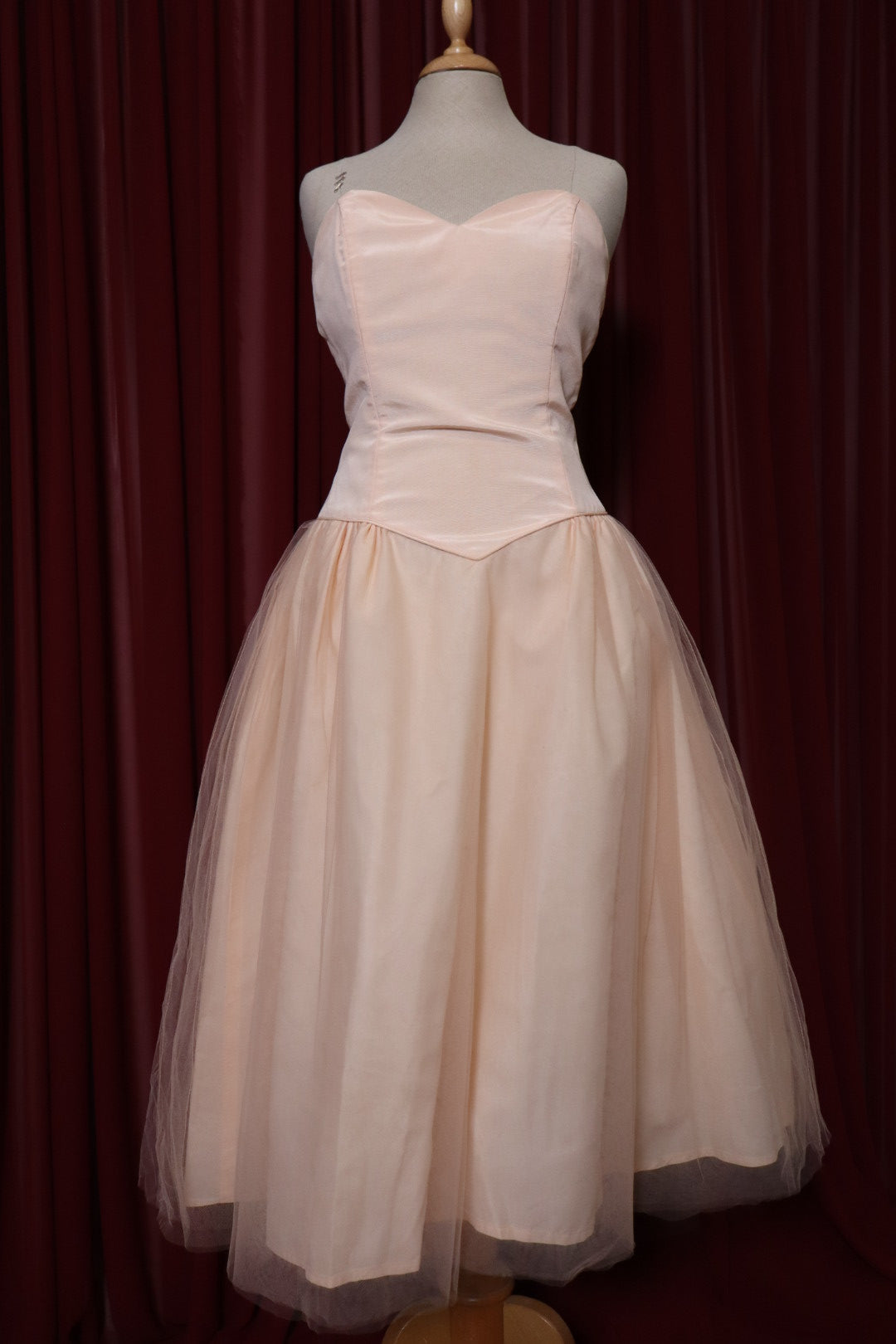 1955’s soft pink prom dress with basque waistline, size M