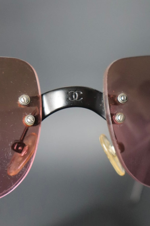 Chanel rimless sunglasses with logo in the middle