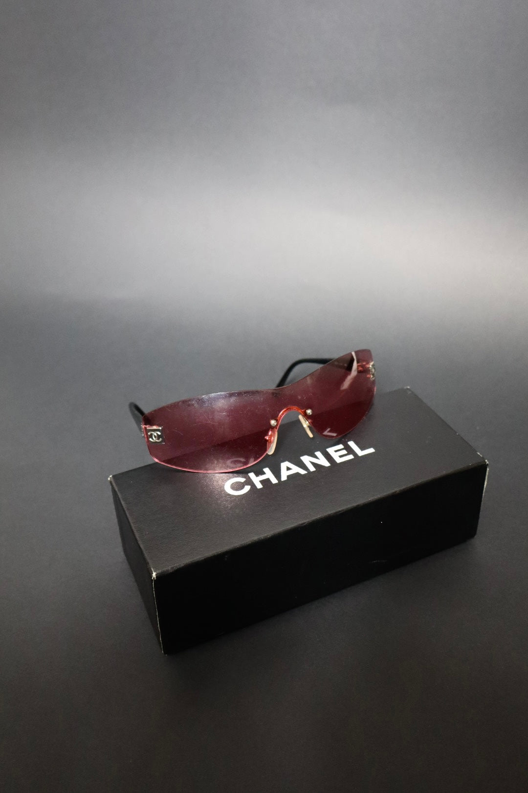 Chanel rimless pink sunglasses with logo on each side