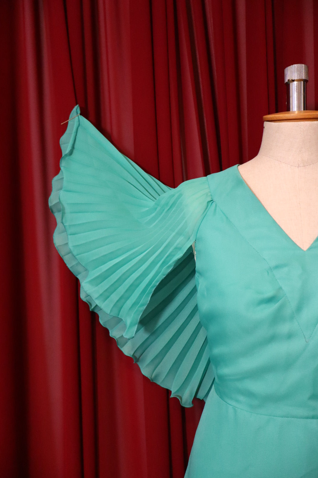 1970’s turquoise long gown with pleaded cape ‘sleeves’ - size L